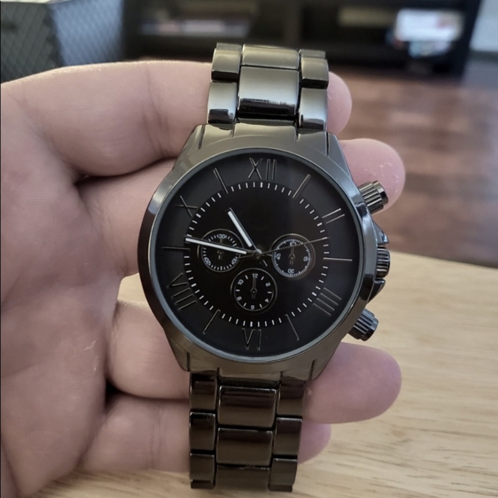 Gray metallic watch.